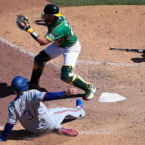 Rangers rally for 4 runs in the 9th inning to beat the Athletics 9-6