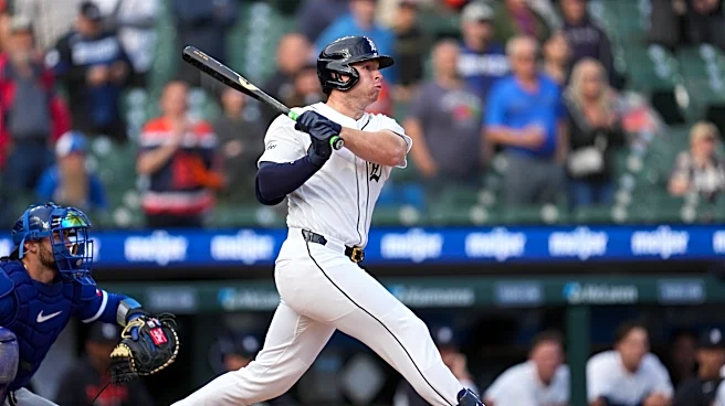 Tigers extend win streak to 6 by rallying in 9th for rain-delayed 10-9 victory over Royals