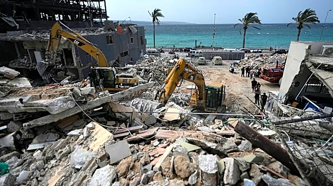 The Latest: Trump and Iran’s top diplomat say the Strait of Hormuz is fully open