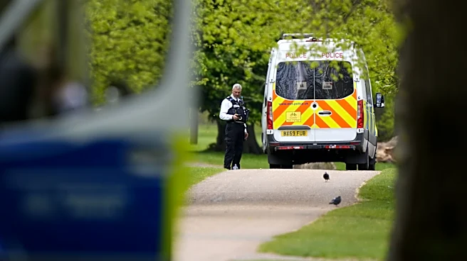 London police, some in protective clothing, probe discarded items near Israeli Embassy