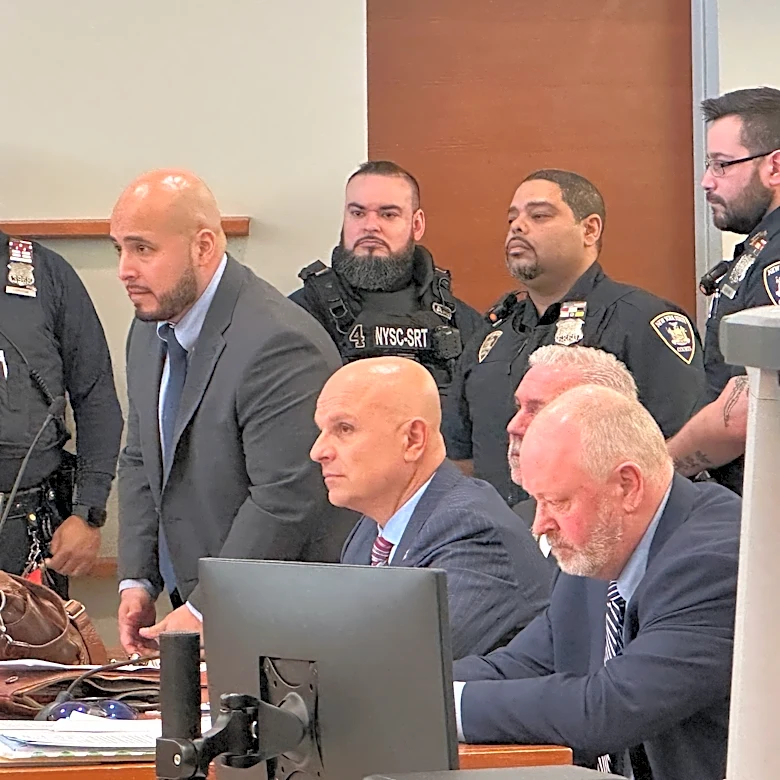 Ex-NYPD sergeant freed from jail while he appeals his conviction for deadly cooler throw