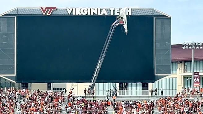 Skydiver gets rescued after crashing into scoreboard before Virginia Tech spring game