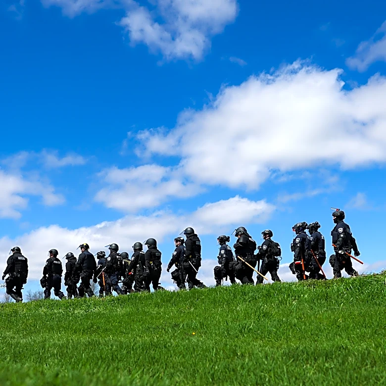 Wisconsin authorities put total arrests from clashes at beagle breeding facility at about 25