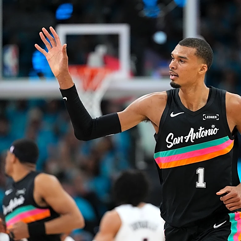 Wembanyama scores 35 points in playoff debut as Spurs roll past Trail Blazers 111-98