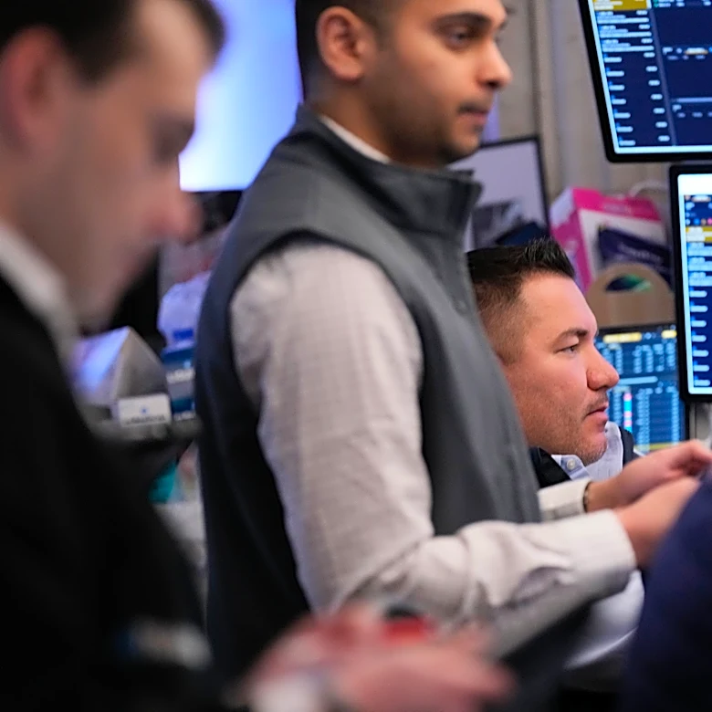 Oil prices rise, but US stocks remain near their record on a muted Wall Street