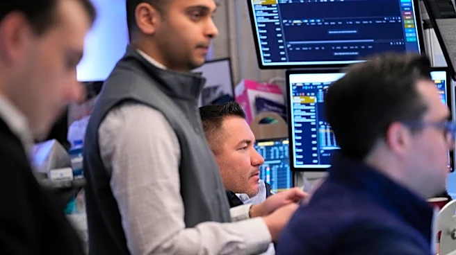 Oil prices rise, but US stocks remain near their record on a muted Wall Street