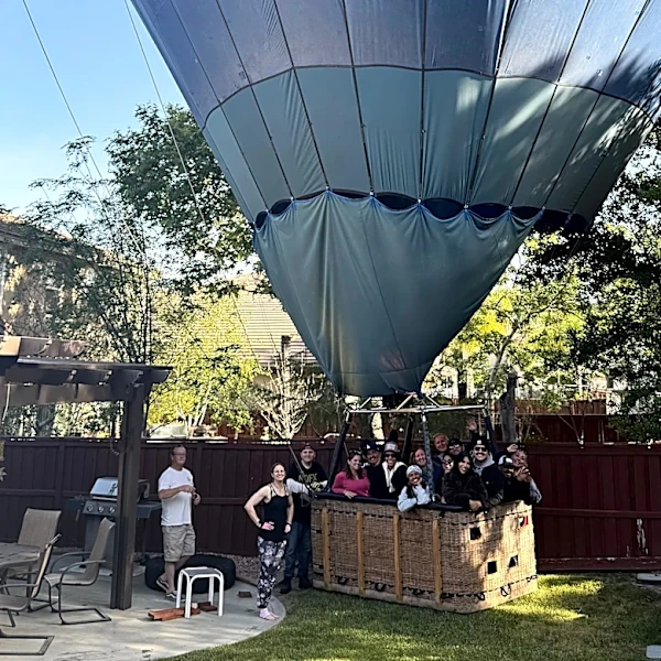 Mind if we drop in? Hot air balloon with 13 aboard makes emergency landing in California backyard