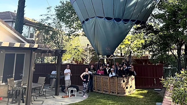 Mind if we drop in? Hot air balloon with 13 aboard makes emergency landing in California backyard