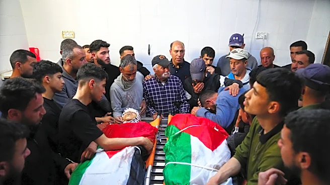 Israeli army reservist kills 2 Palestinians, including a 14-year-old, in the occupied West Bank