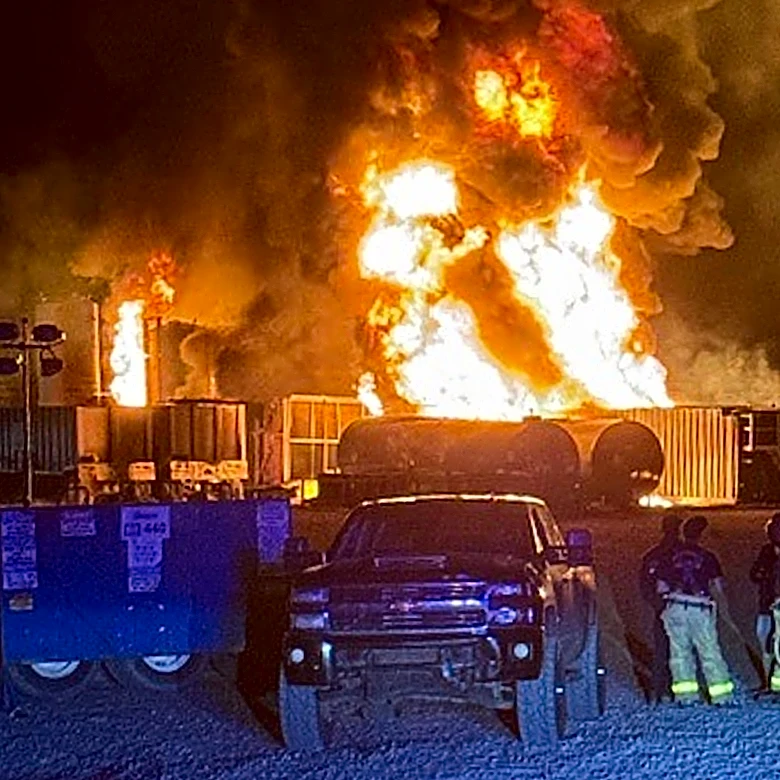 A well site explosion triggers a large fire and evacuations in Texas, but no injuries