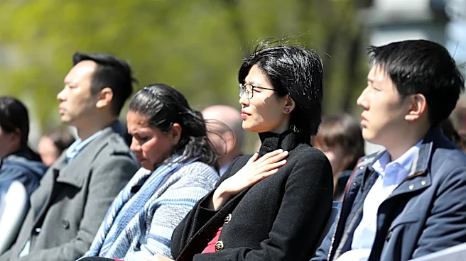 49 new Americans sworn in on Lexington’s Battle Green, birthplace of the American Revolution