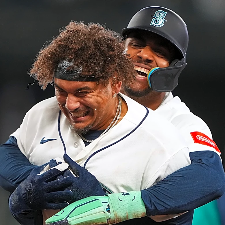Josh Naylor hits walk-off single and Cal Raleigh homers as Mariners beat A's 5-4 to avoid sweep