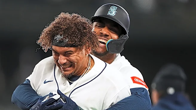 Josh Naylor hits walk-off single and Cal Raleigh homers as Mariners beat A's 5-4 to avoid sweep