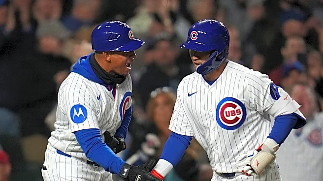 Busch and Suzuki homer as the Cubs beat the sliding Phillies 7-2 for their 8th straight win