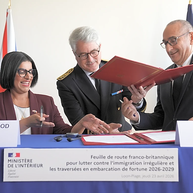UK and French governments sign a 3-year deal to curb migrant crossings in English Channel