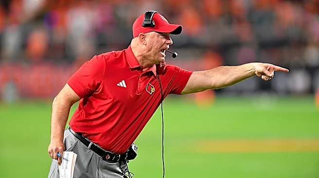 Louisville and football coach Jeff Brohm agree to contract extension through 2033 season