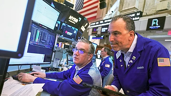 US stocks fall below their record highs as oil prices rise