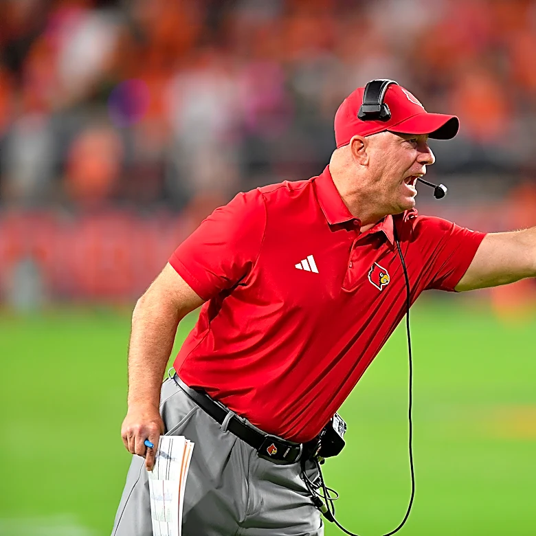 Louisville and football coach Jeff Brohm agree to new deal with extension through 2033 season