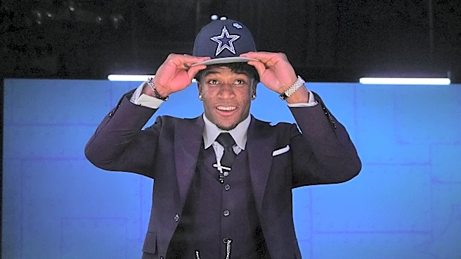 Cowboys get Ohio State's Downs and UCF's Lawrence in NFL draft after moving twice in 1st round