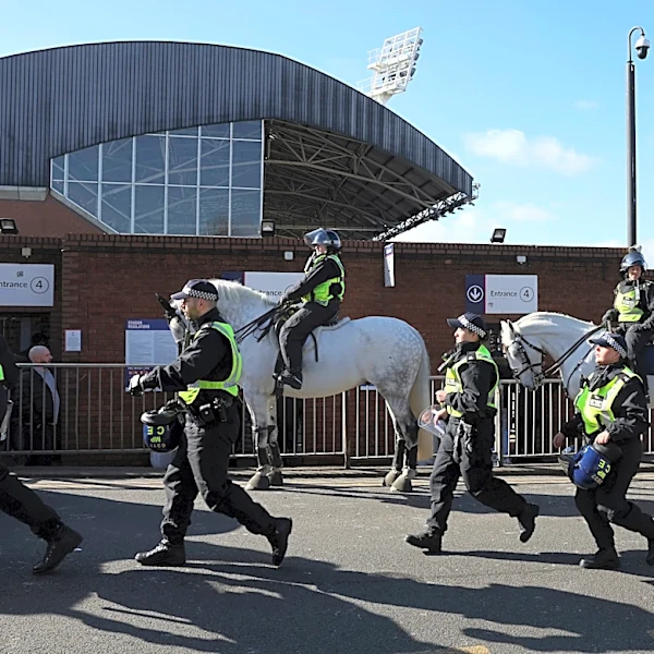 Millwall fumes after anti-racism booklet shows club's logo on a Ku Klux Klan robe