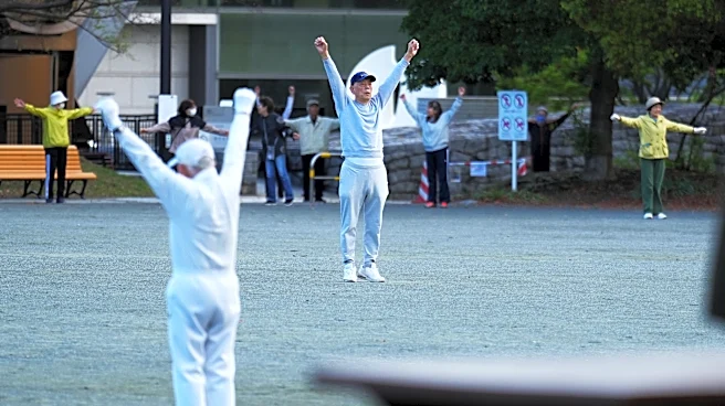 Japan awakens to Radio Taiso exercise tradition. One face of the country's longevity