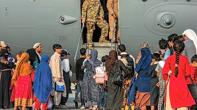Afghanistan calls on Afghans who helped US in war and are now stuck in Qatar to return home