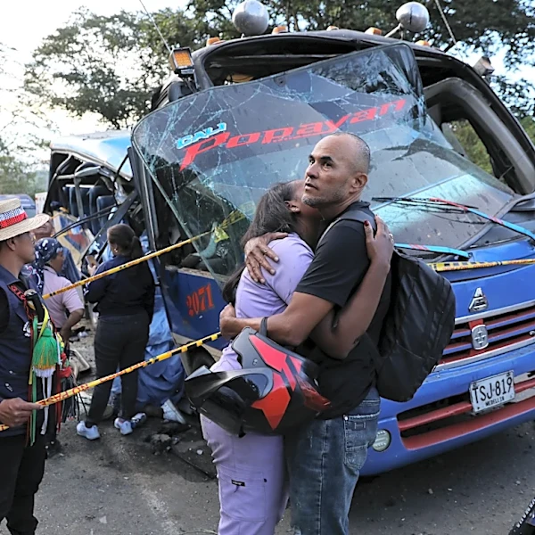 An explosive device kills 13 and injures 38 on a bus in southwestern Colombia as violence persists