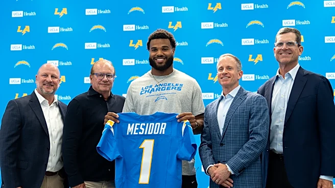 Chargers bet on the trenches, adding an edge rusher and a center-turned-guard in the draft