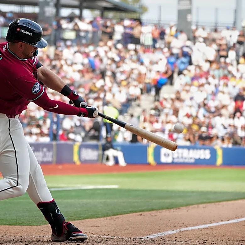 Tawa's slam helps Diamondbacks rally from 5-run deficit to beat Padres 12-7 in Mexico City