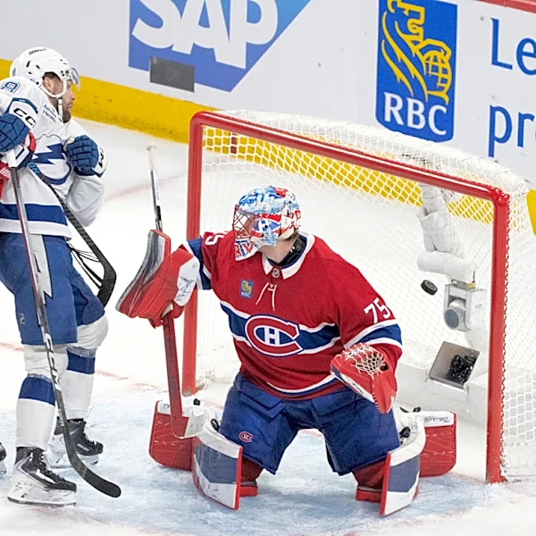 Hagel scores twice in 3rd, Lightning beat Canadiens 3-2 in Game 4 to tie series