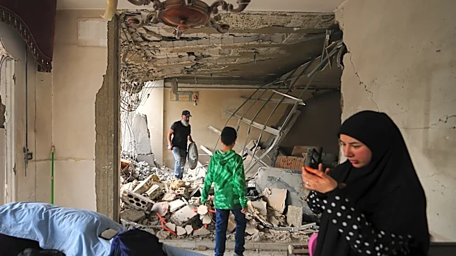 The Latest: Iran offers to reopen Strait of Hormuz if US lifts blockade and war ends, officials say