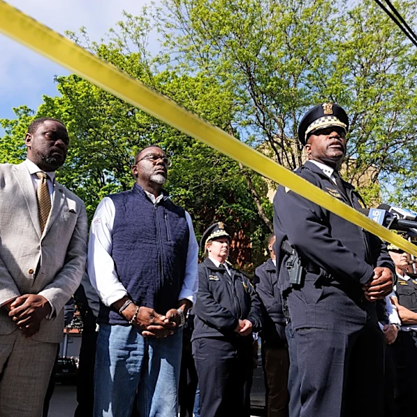 Suspect in killing of one Chicago police officer and wounding of another will remain jailed