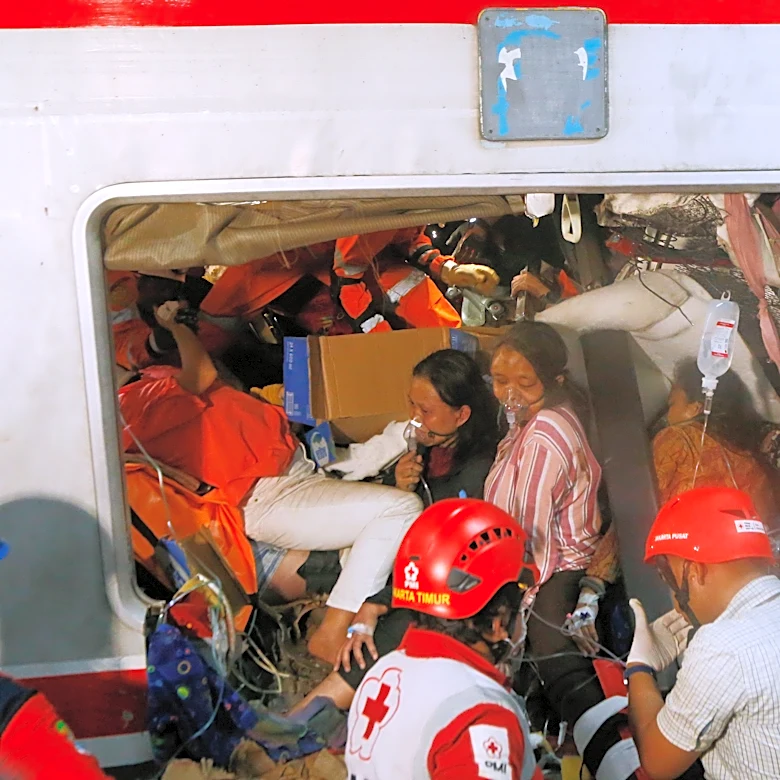 Rescuers recover last victims from Indonesia train wreck that killed 14 and injured dozens