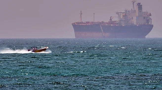 US military says it boarded cargo ship suspected of heading to Iran during blockade but released it