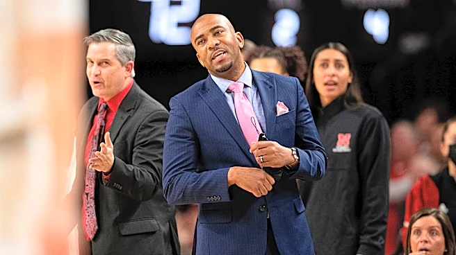 Attorney says in court papers that ex-Nebraska assistant Chuck Love admitted having sex with player