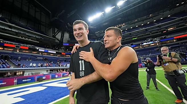 Heisman runner-up Pavia agrees to sign with the Ravens as an undrafted free agent, an AP source says