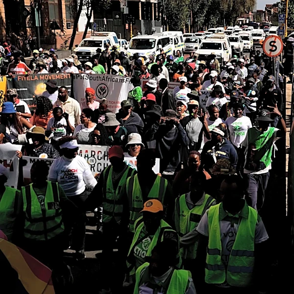 Hundreds march in Johannesburg against illegal migration as shops shut over looting fears