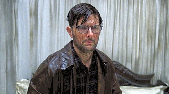 Movie Review: Adam Scott gets spooked in a haunted hotel in ‘Hokum’