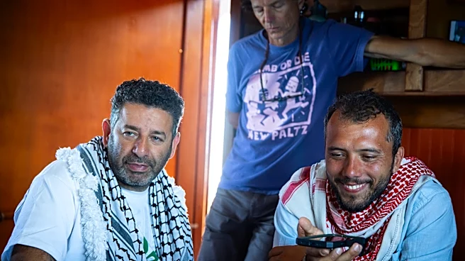 Israeli authorities taking 2 activists from a Gaza-bound flotilla to Israel for questioning