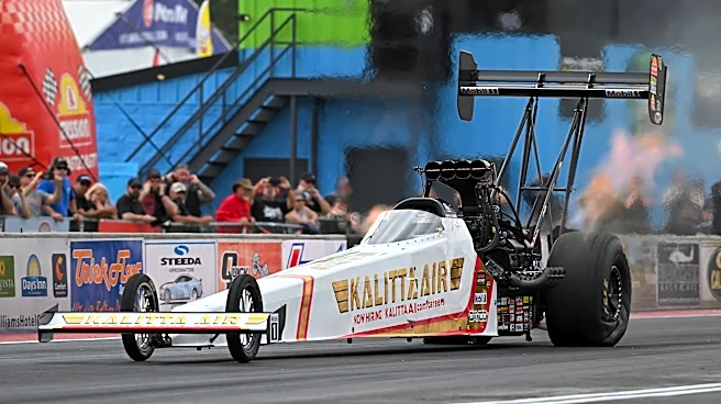 Shawn Langdon breaks the NHRA speed record by reaching 345 mph in his Top Fuel dragster