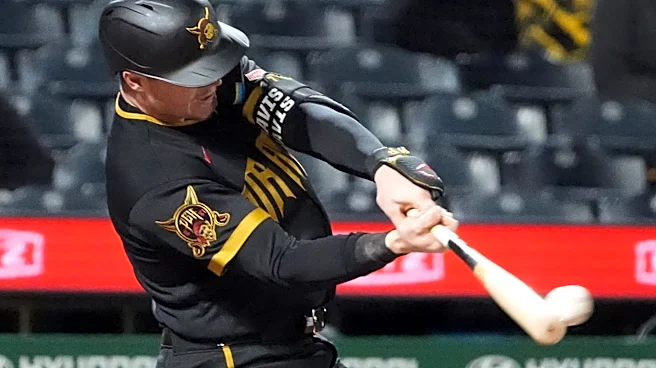 Davis homers twice, Keller works 7 strong innings as the Pirates beat Central-leading Reds 9-1