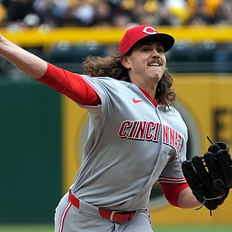 The Reds tie an MLB record by walking seven straight batters in a 17-7 loss to the Pirates