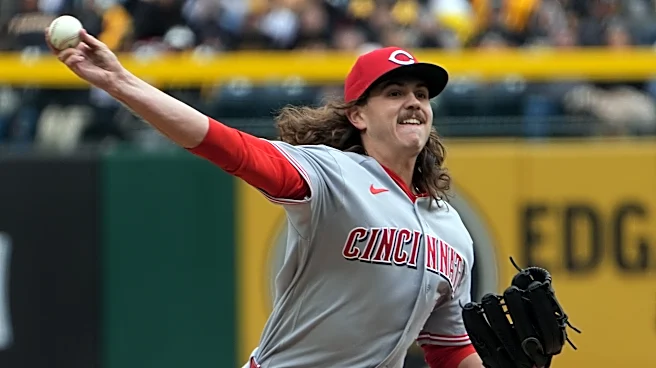 The Reds tie an MLB record by walking seven straight batters in a 17-7 loss to the Pirates