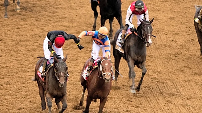 Jockey Jose Ortiz comes from last to pass brother Irad and win Kentucky Derby