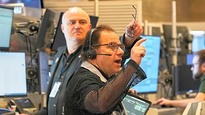 Wall Street falls from its records and oil prices jump after fighting flares in the Middle East