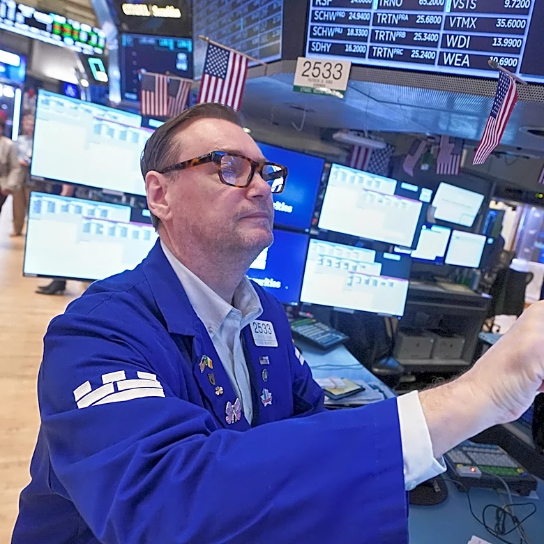 Wall Street flirts with records after oil prices give back some of Monday's spurt