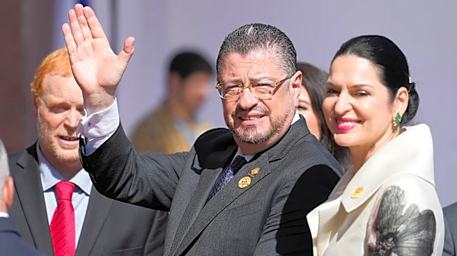 Costa Rica's leader to keep immunity as minister in his successor's government in face of legal woes
