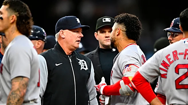Rafaela homers and drives in four runs as the Red Sox rout the Tigers 10-3