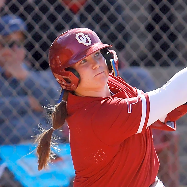 In a battle like McGwire and Sosa's '98 home run chase, Oklahoma, UCLA softball sluggers near record