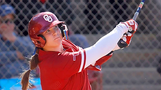 In a battle like McGwire and Sosa's '98 home run chase, Oklahoma, UCLA softball sluggers near record